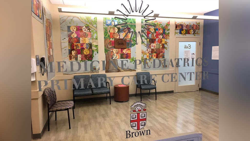 waiting room with Medicine Pediatrics Primary Care Center on door and a Brown logo