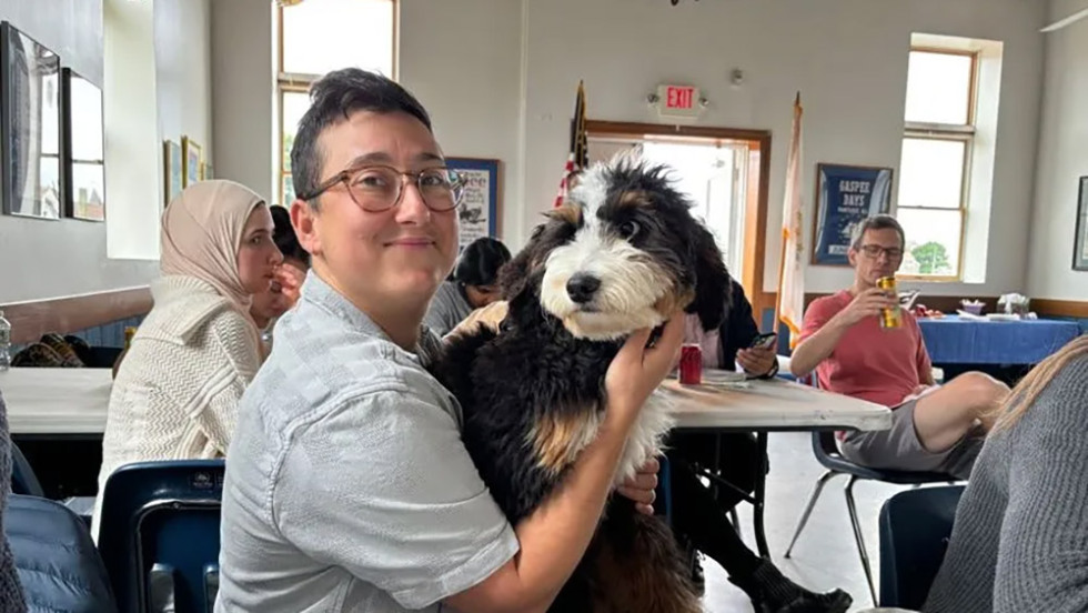 person holding a dog