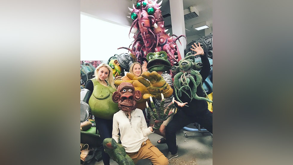 several people in elaborate costumes